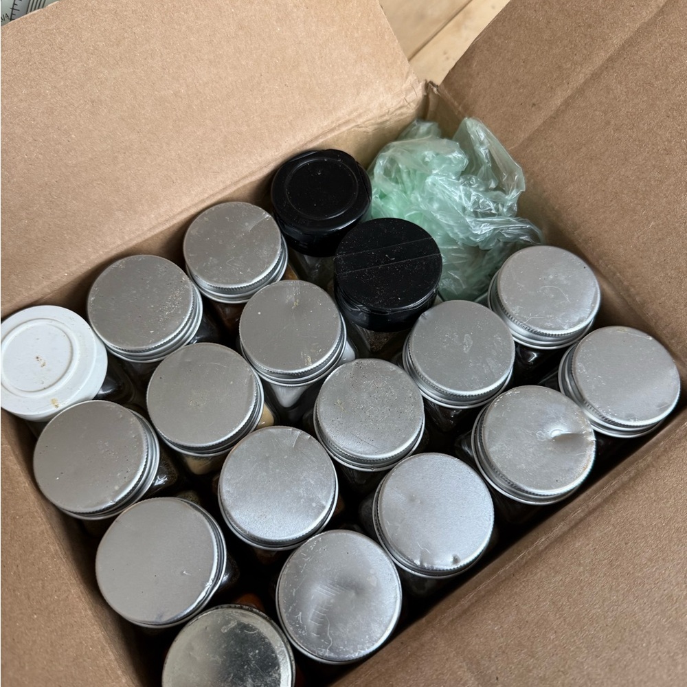 Spice bottles, used, require cleaning all bottles have lids, not matching